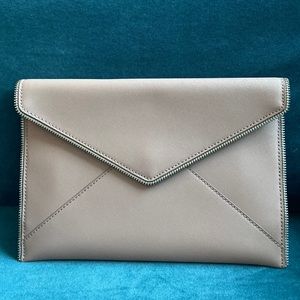 Like new Rebecca Minkoff cream envelope clutch with dust cover